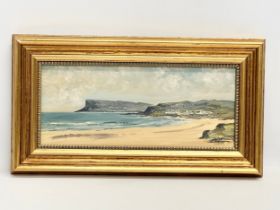 An oil painting on board by E.I. Bryce. Ballycastle, County Antrim. 34x14cm. Frame 44.5x24.5cm