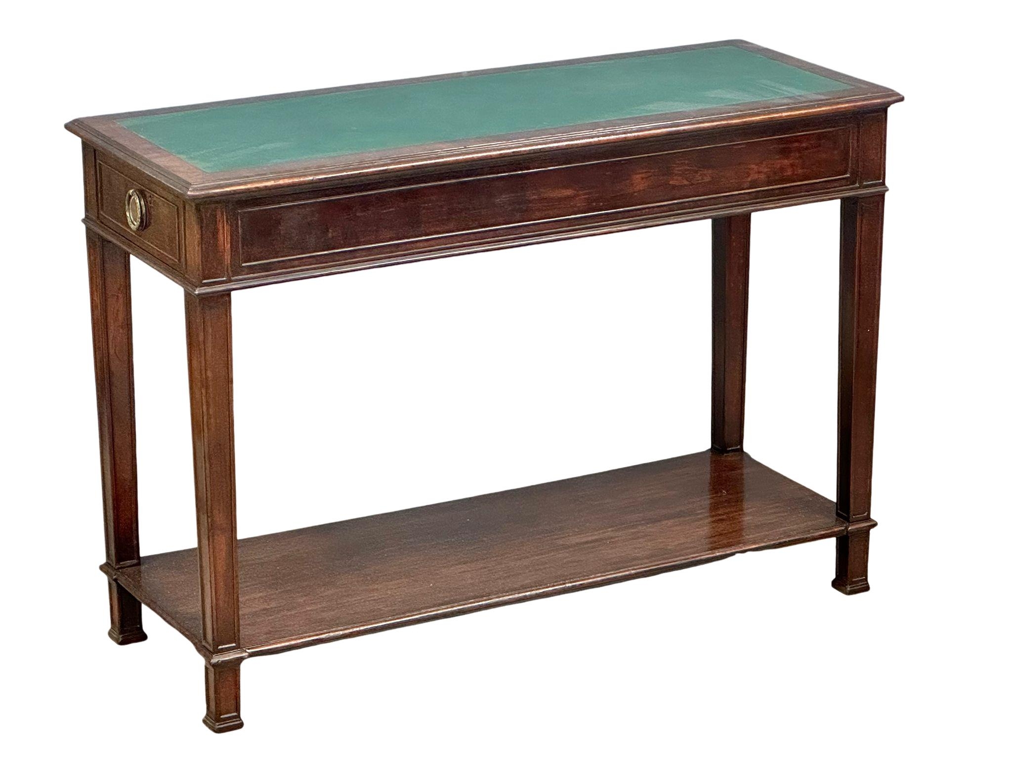 A Robert Adam style late 19th/early 20th century Mahogany side table with two drawers and leather