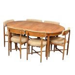 A G-Plan "Fresco" Mid Century teak extending dining table and 6 chairs designed by Victor Wilkins.