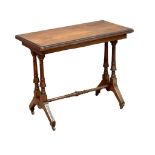 A Victorian oak turnover games table in the Aesthetic Movement style. 92x46x74.5cm