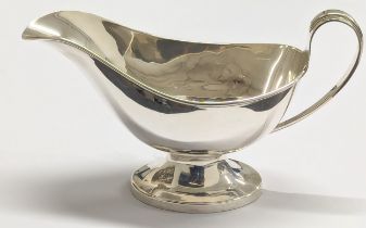 An early 20th century silver gravy boat by J. & C. Birmingham, 1912. 76.47g