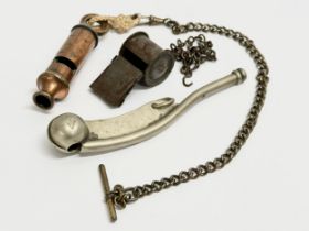 3 whistles. A Naval Bosun’s whistle, The Acme Boy Scouts Whistle and other.