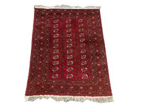 A vintage hand knotted Turkoman Afghan rug. 195x135cm