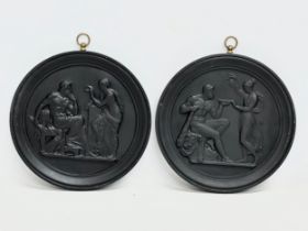 A pair of ceramic wall plaques. In the manner of Bertel Thorvaldsen. 16x17cm