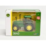 A Britains John Deere 3640 tractor in box. 20x10x14cm