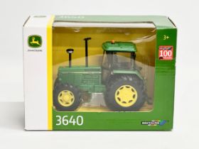 A Britains John Deere 3640 tractor in box. 20x10x14cm