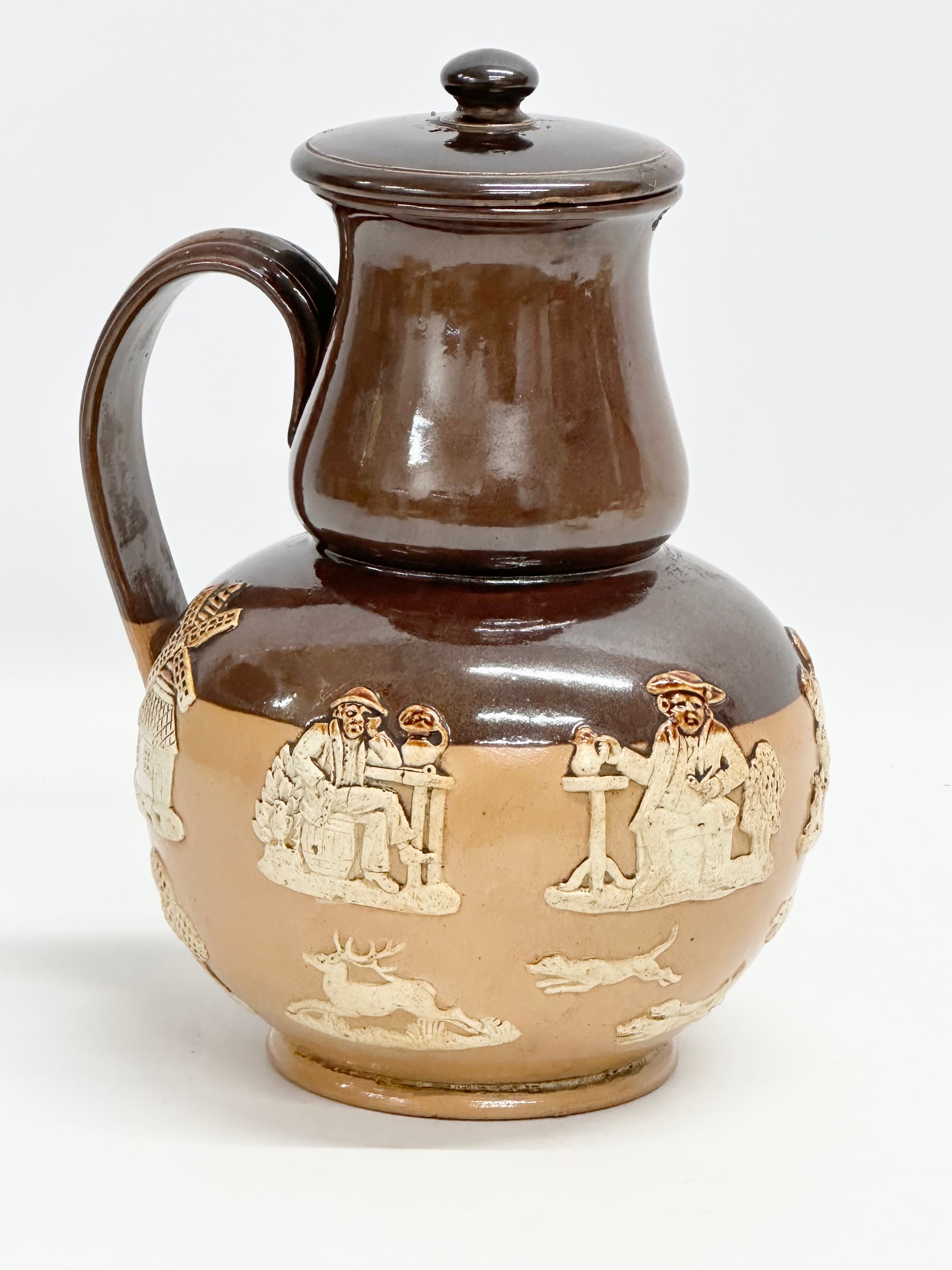 A Royal Doulton Lambeth ‘Harvest’ flagon with spout and sieve. Early 20th century. 17x15x25cm - Image 6 of 7