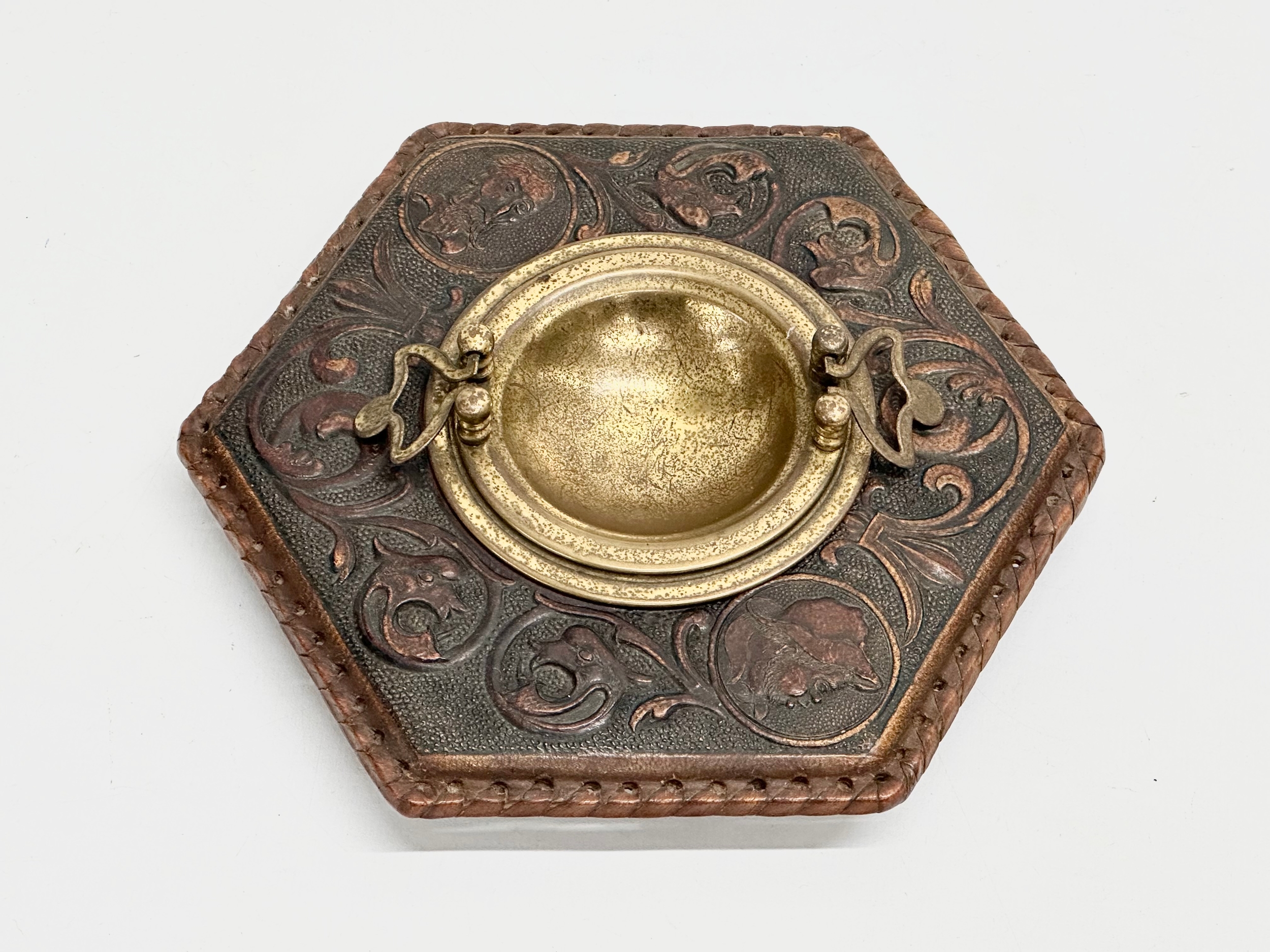 A late 19th century embossed leather bound ashtray with original brass liner. Depicting Don - Image 3 of 8