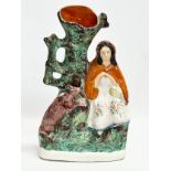 A large mid 19th century Staffordshire ‘Little Red Riding Hood’ spill vase. 20x33.5cm