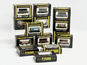 14 Graham Farish train carriages and wagons in boxes.