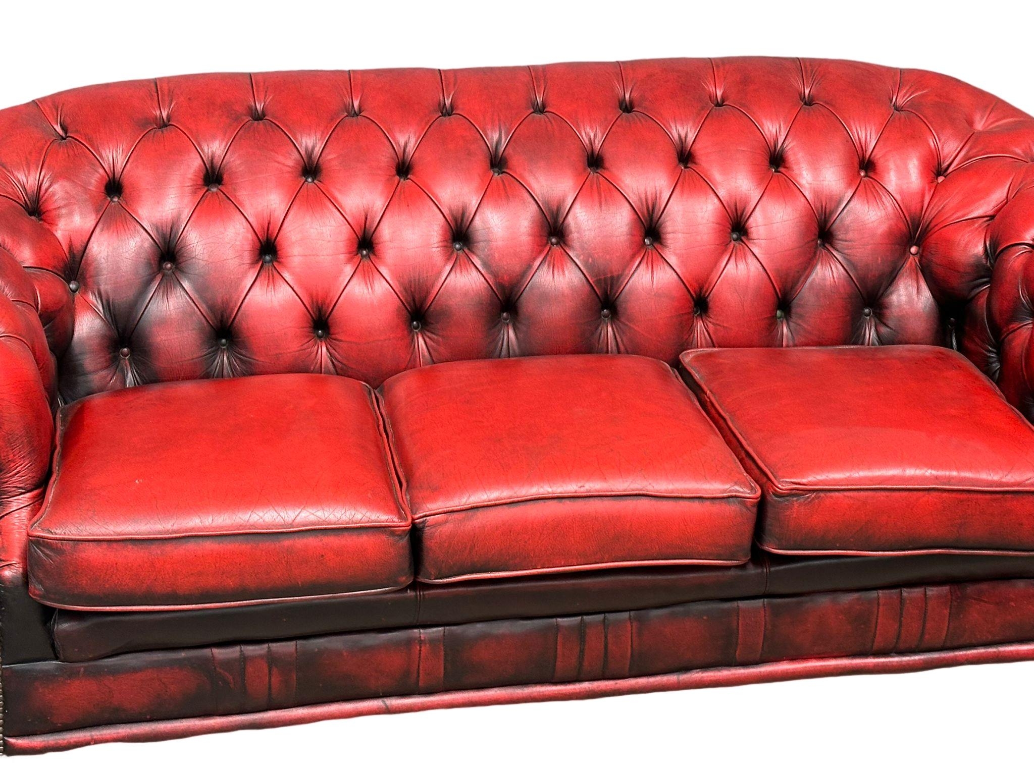 A deep buttoned ox-blood leather Victorian style 3 seater sofa. 207cm - Image 3 of 5