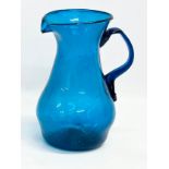 A large late 18th century hand blown Bristol Blue water jug. Circa 1760-1800. 17x14x22cm