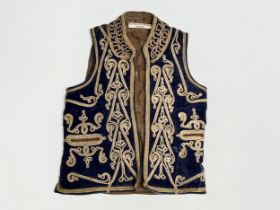 A vintage Afghan embroidered vest. David W. McCormick School.