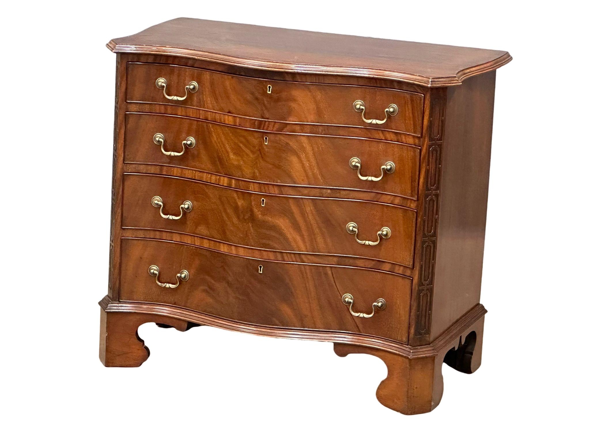 A good quality late 19th century Chippendale Revival mahogany serpentine front chest of drawers.