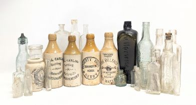 A collection of late 19th / early 20th century glass and stone bottles. V. Hoytema & C., Neal