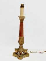 A good quality early 20th century French Empire style brass table lamp with 3 paw feet. Circa