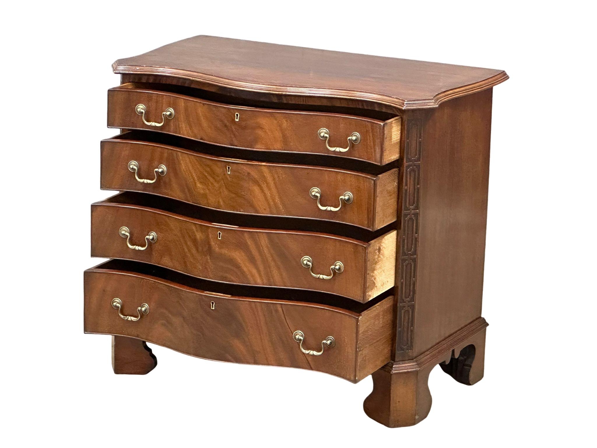 A good quality late 19th century Chippendale Revival mahogany serpentine front chest of drawers. - Image 8 of 22