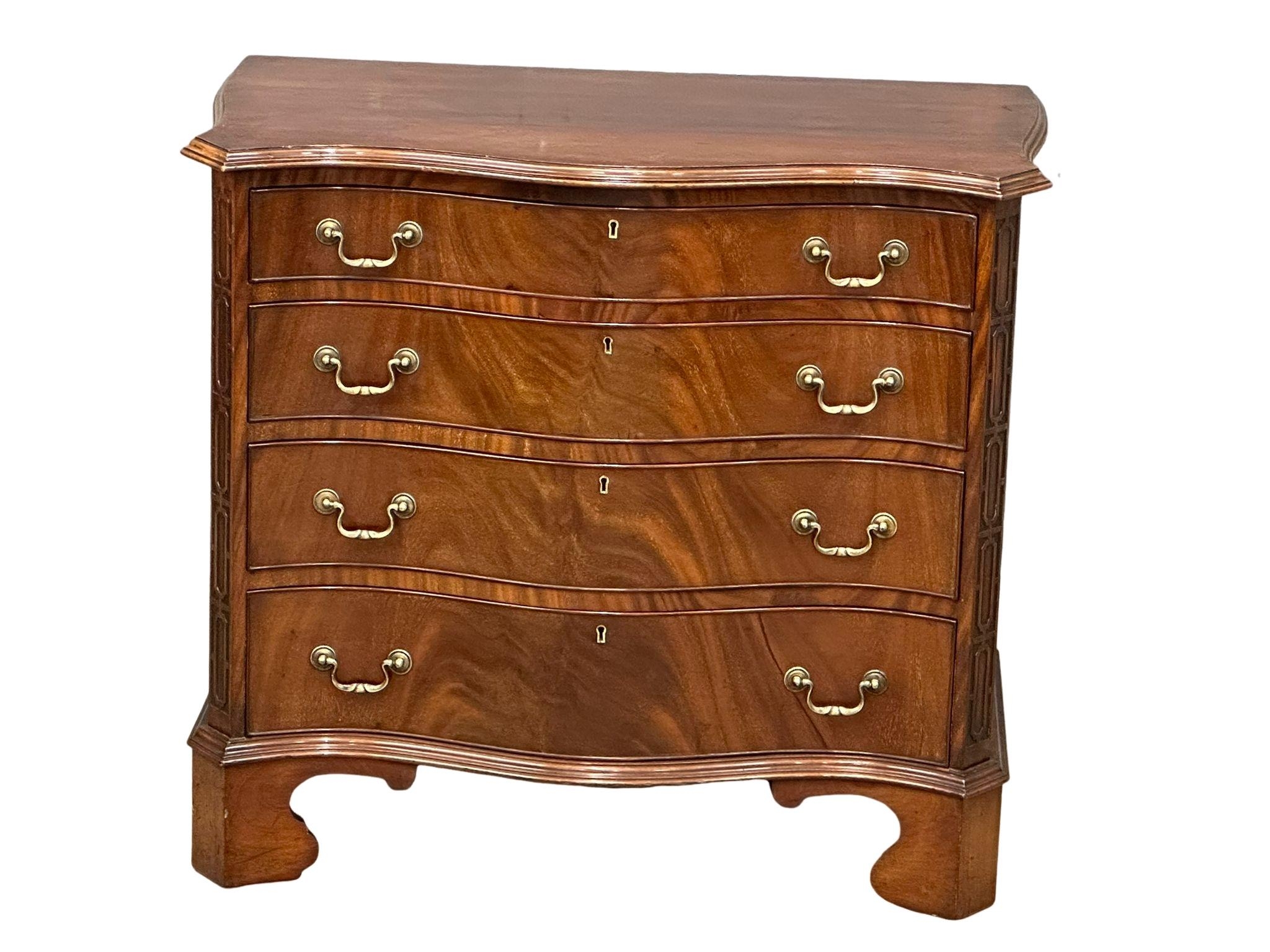 A good quality late 19th century Chippendale Revival mahogany serpentine front chest of drawers. - Image 21 of 22