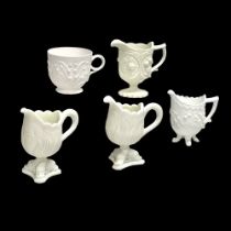 5 pieces of late 19th century W. H. Heppell & Co glass creamers. Circa 1880.