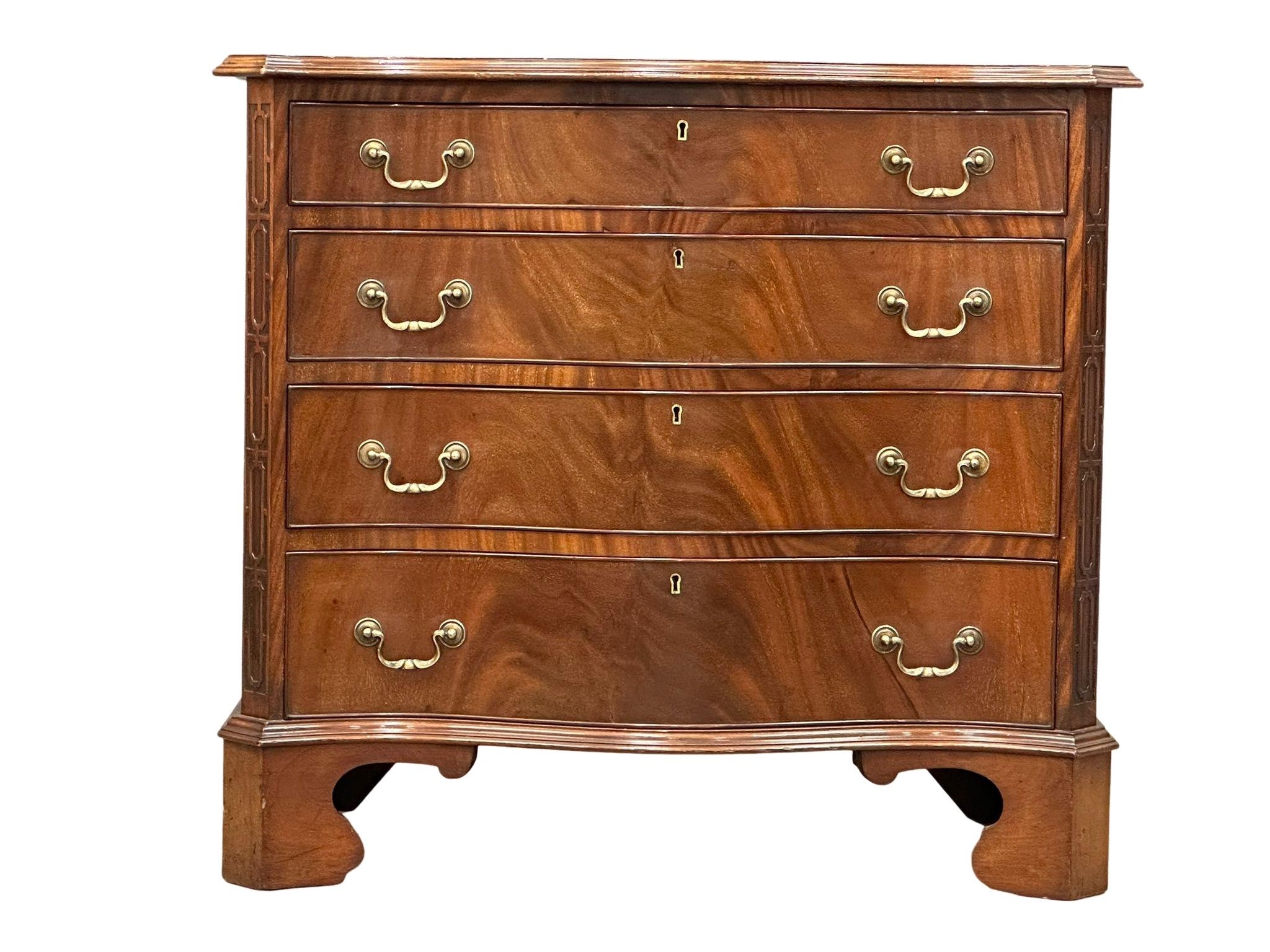 A good quality late 19th century Chippendale Revival mahogany serpentine front chest of drawers. - Image 12 of 22