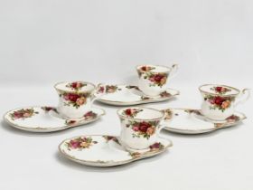 A set of 4 Royal Albert ‘Old Country Roses’ sandwich saucers and cups.