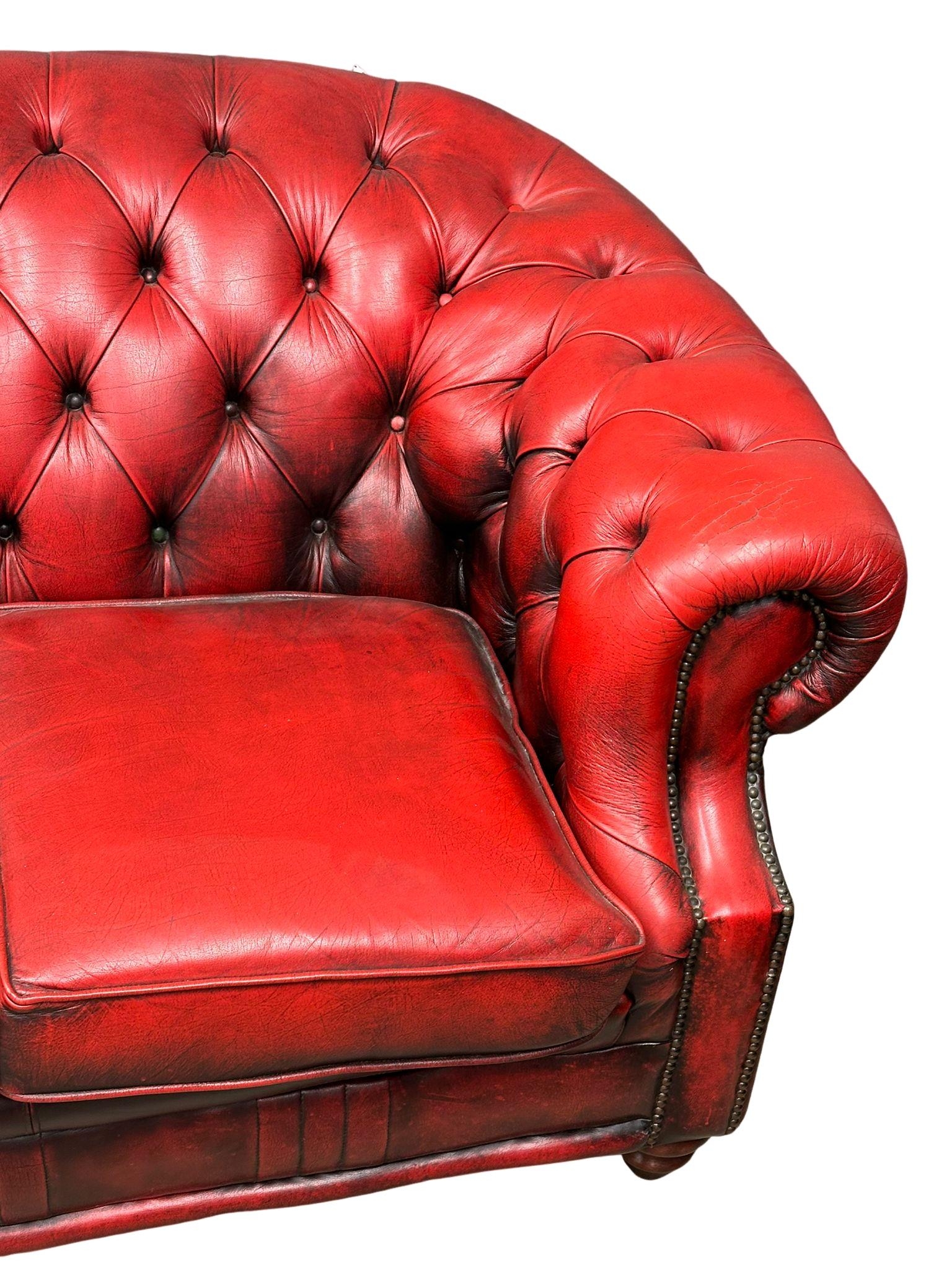 A deep buttoned ox-blood leather Victorian style 3 seater sofa. 207cm - Image 4 of 5