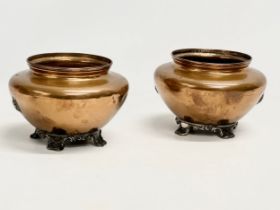 A pair of late 19th century copper jardinières. 18x12.5cm