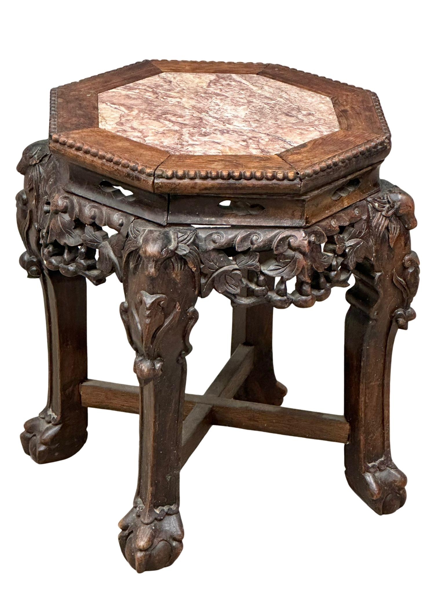 A late 19th century Burmese carved Padauk jardiniere stand/lamp table with marble top. 42x44.5cm