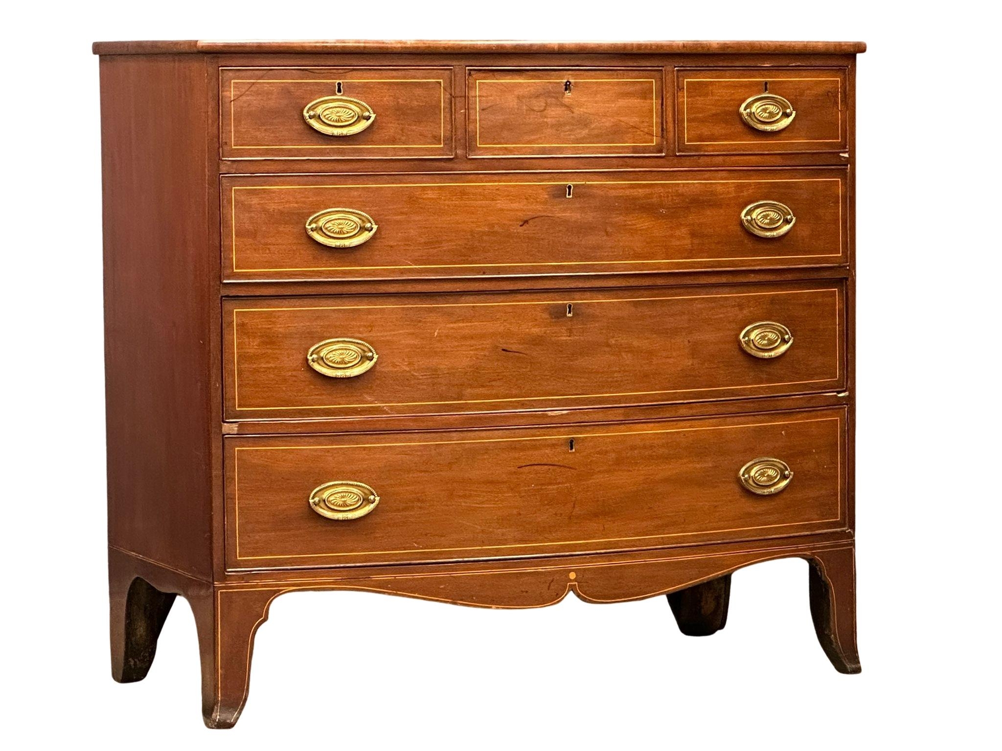 A George IV Inlaid mahogany box front chest of drawers with brass drop handles on splayed feet. - Image 3 of 8