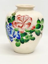 A large crackle glazed pottery vase with enamelled flower decoration. Early/Mid 20th century.