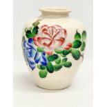 A large crackle glazed pottery vase with enamelled flower decoration. Early/Mid 20th century.
