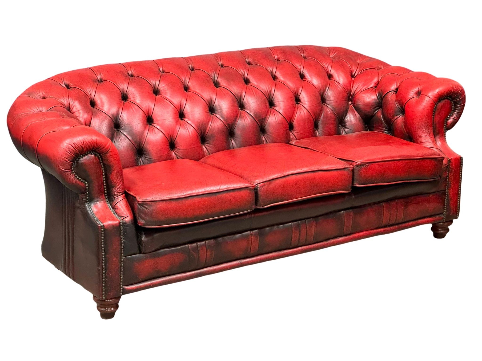 A deep buttoned ox-blood leather Victorian style 3 seater sofa. 207cm - Image 2 of 5