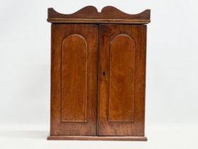 A late Victorian Apprentice cabinet. 35x12x46cm