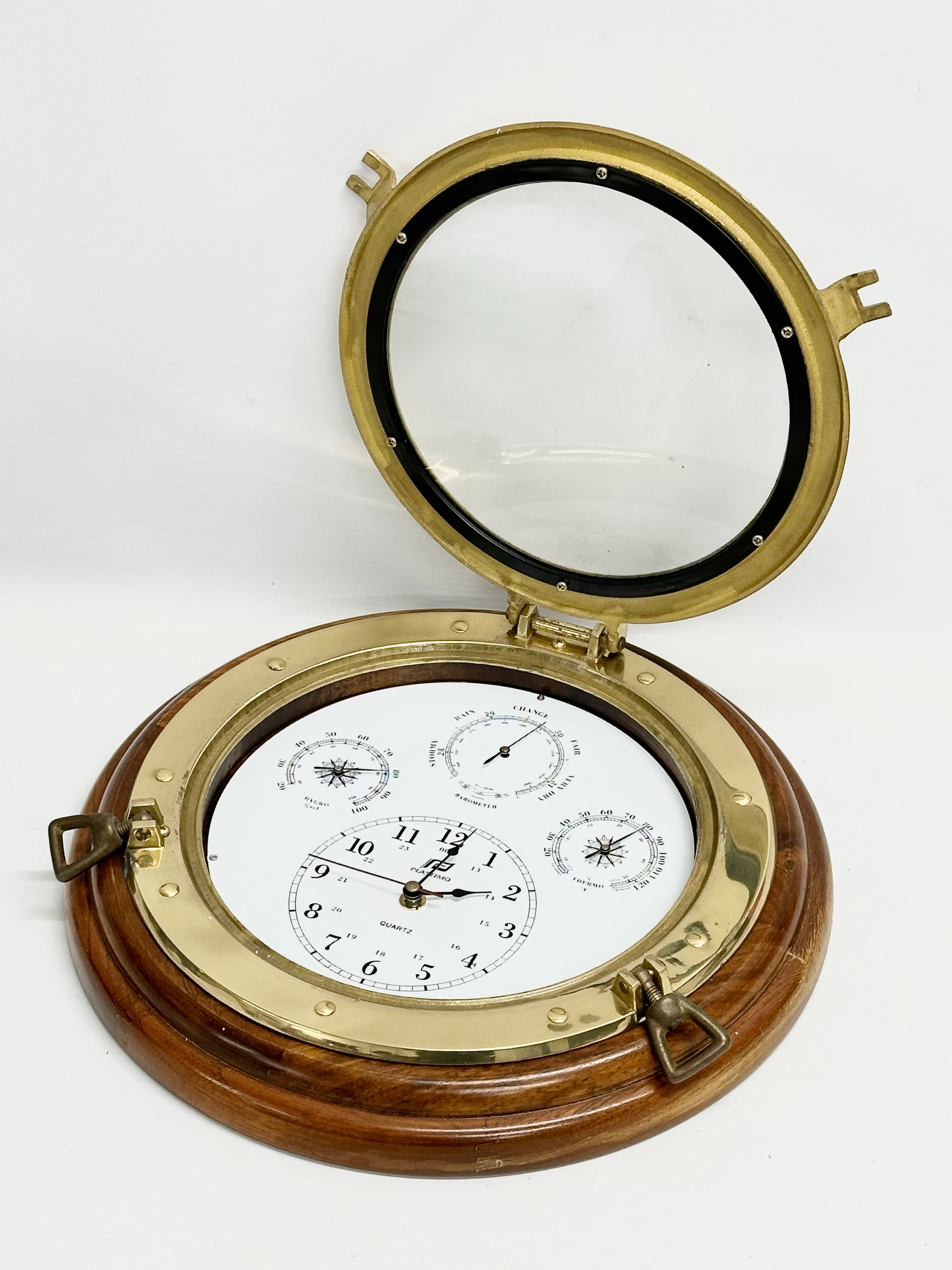 A Plastimo Porthole Weatherman barometer wall clock. 34.5cm - Image 2 of 5