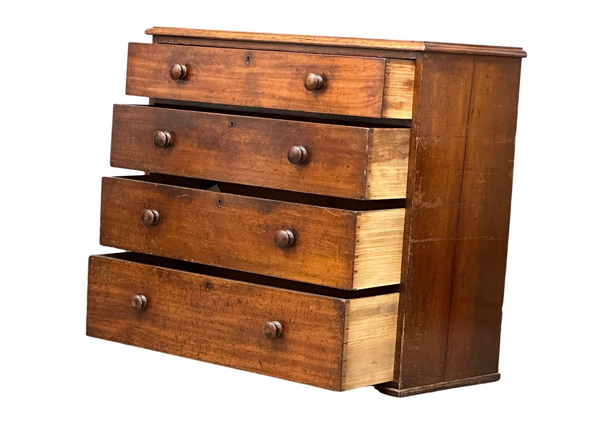 A large Victorian mahogany chest of drawers with bun handles, 109cm x 51cm x 101cm - Image 2 of 5