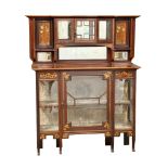 An Edwardian inlaid mahogany Art Nouveau display cabinet with bowed glass panels. 129x40.5x167cm(1)