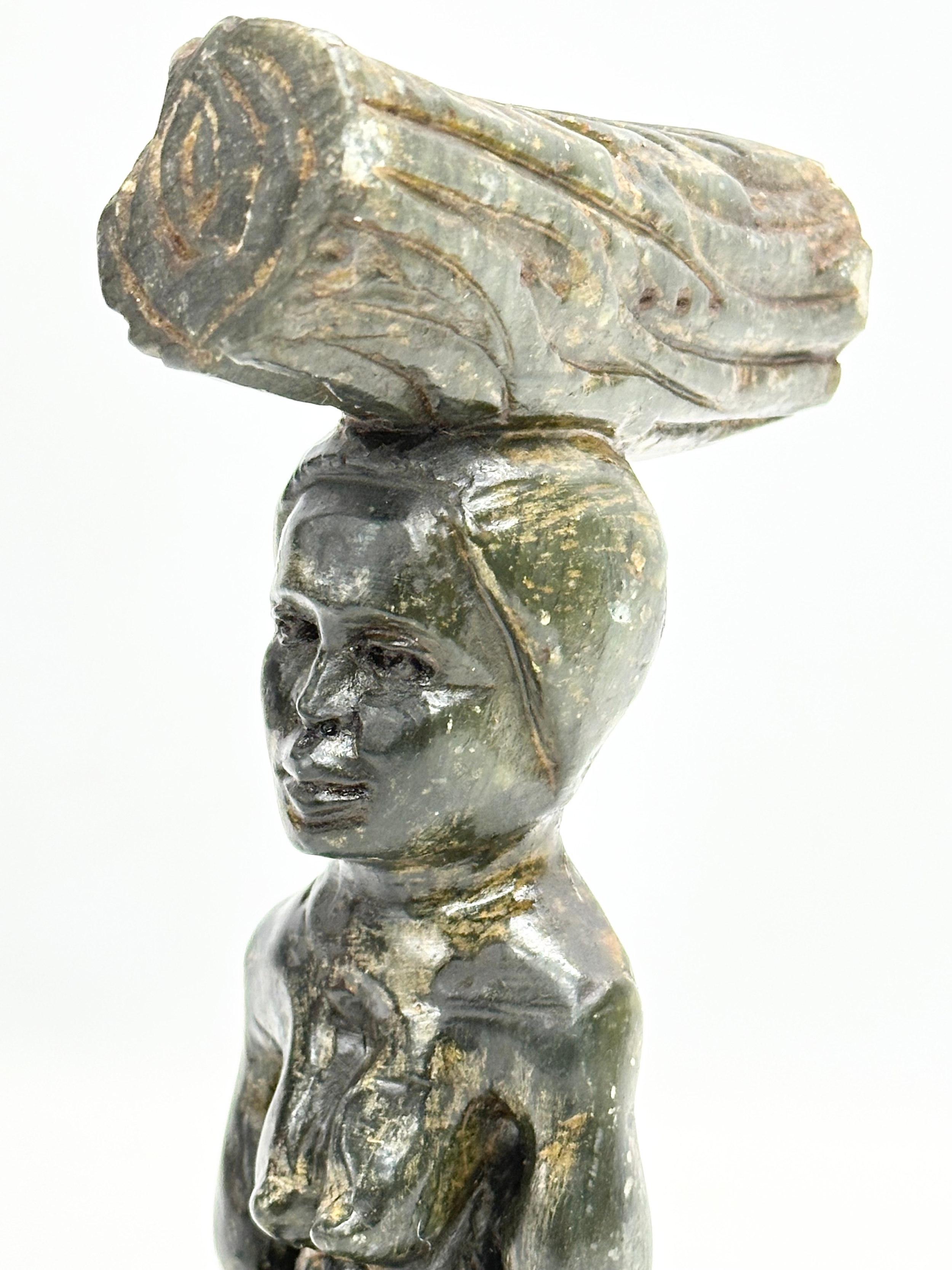 An early 20th century African painted stone figurine. 21cm - Image 2 of 5