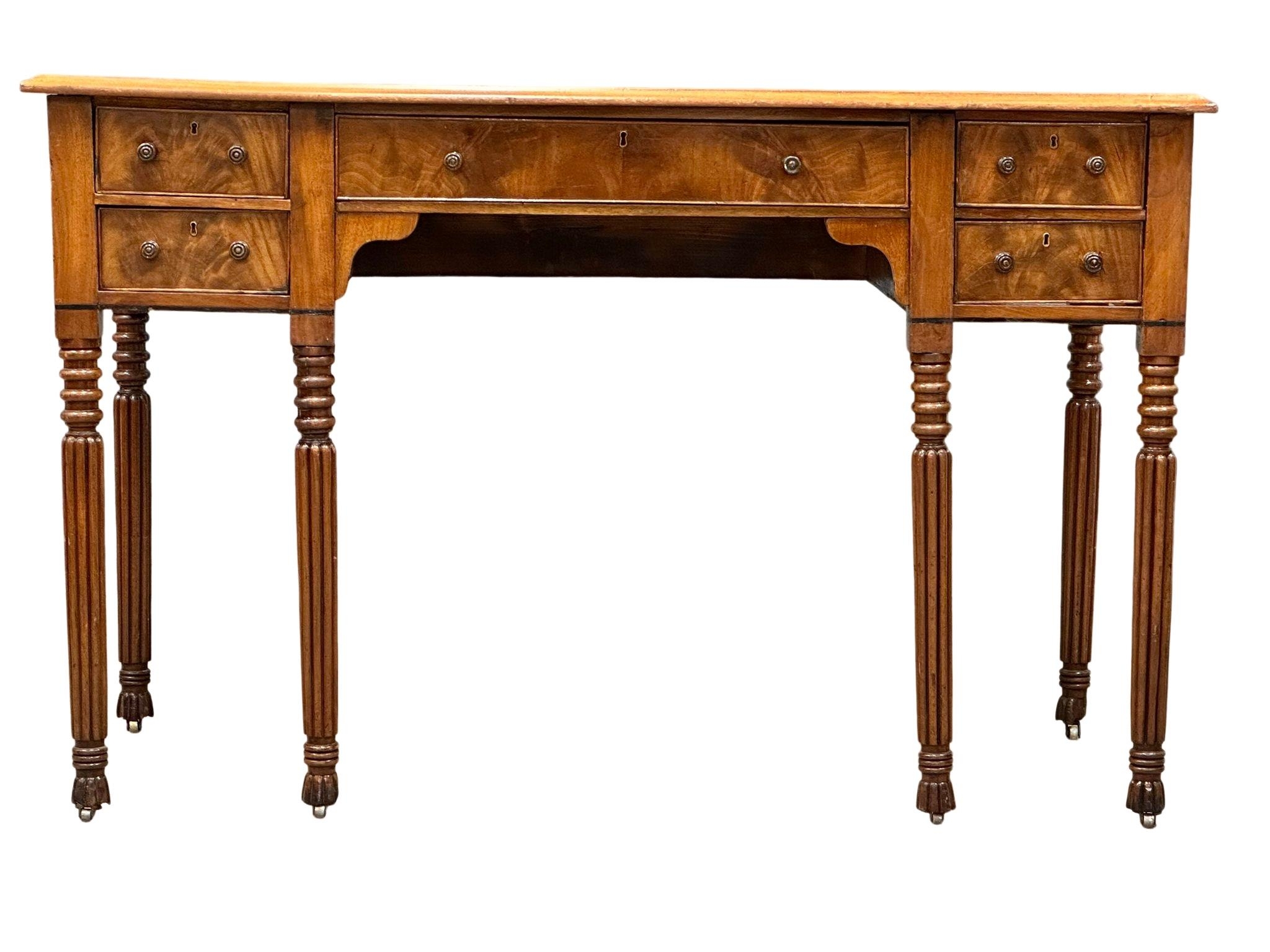 A late George IV mahogany side table/desk on reeded legs. 126cm x 61cm x 80cm - Image 8 of 9