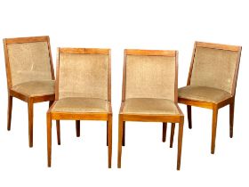 A set of 4 Mid Century teak dining chairs.(1)