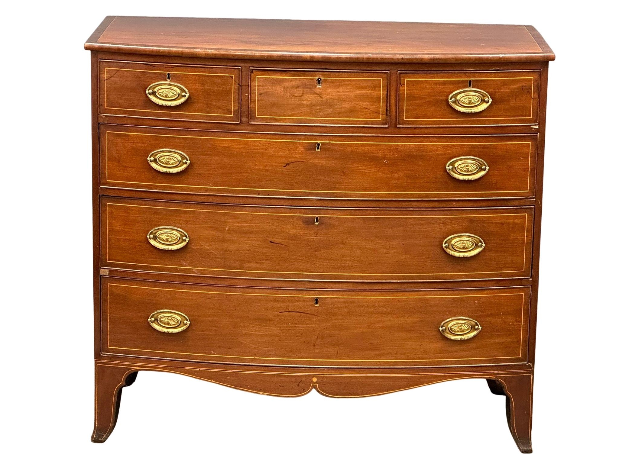 A George IV Inlaid mahogany box front chest of drawers with brass drop handles on splayed feet. - Image 6 of 8