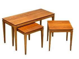 A Mid Century teak coffee table with 2 nesting tables, designed by Richard Hornby. 91x40x48.5cm