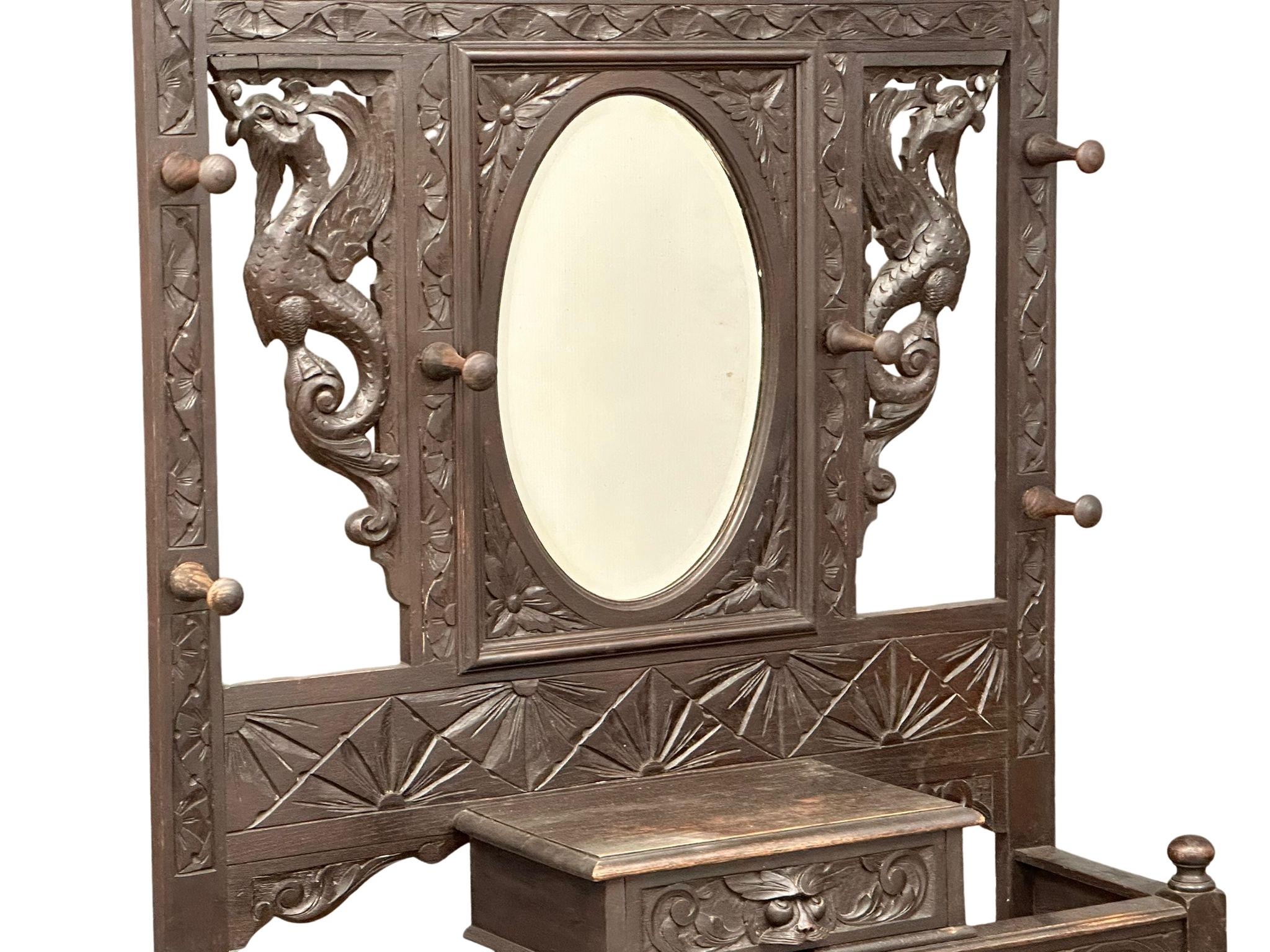 A large 19th century carved oak hallstand. Circa 1860-1880. 120x36x195cm - Image 3 of 5