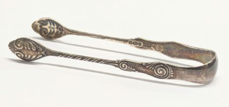 A pair of late 19th century silver sugar tongs by Mappin & Webb. Sheffield 1895. 17.8g