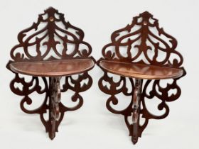 A pair of mahogany Open Fret wall sconces. 23x35.5x13cm