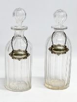 A pair of 19th century Victorian glass decanters with etched wire design. 26.5cm