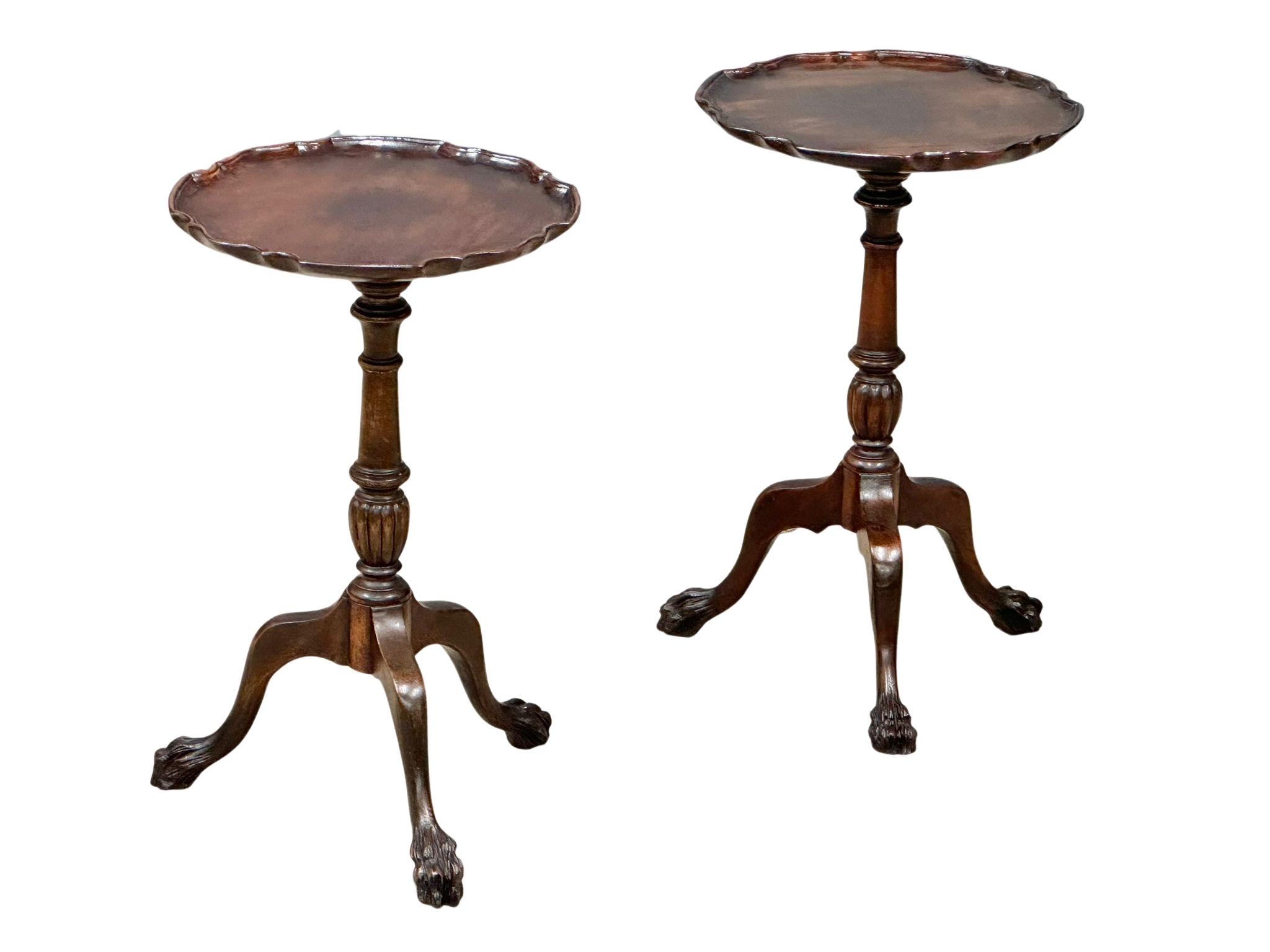 A pair of good quality Chippendale revival mahogany pedestal wine tables on carved paw feet. 32cm