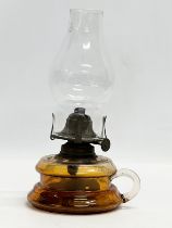 A Victorian oil lamp/finger lamp. 14x25cm