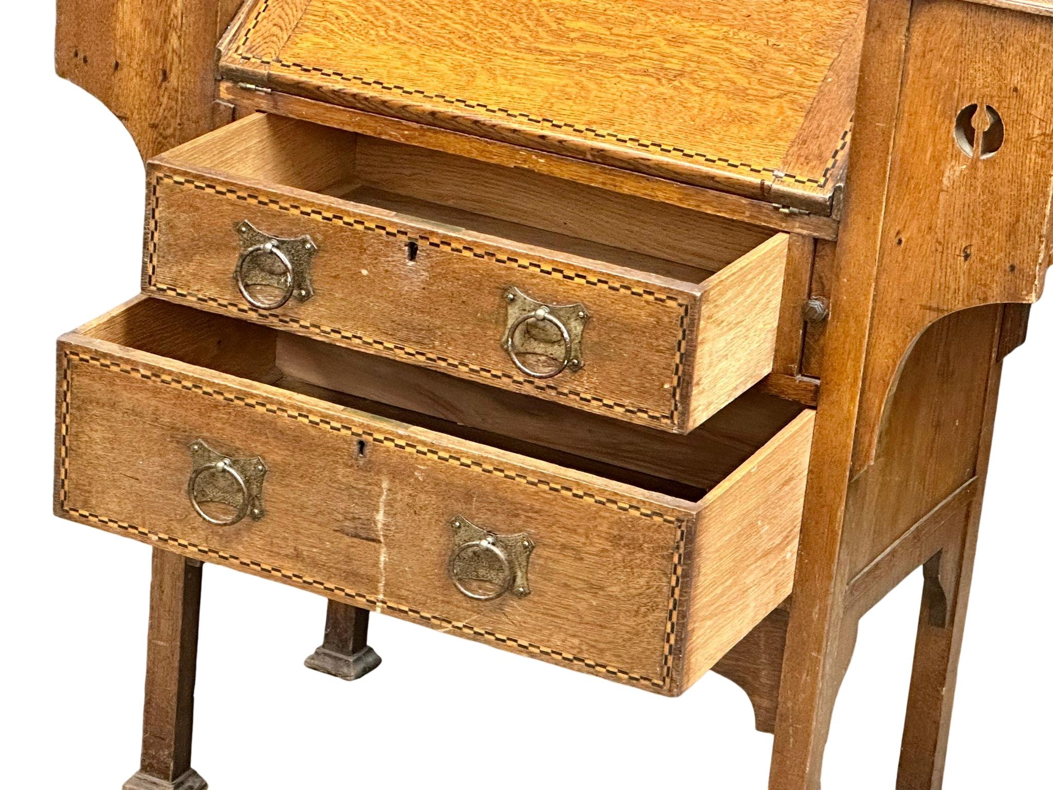 An early 20th century Art & Crafts inlaid oak writing bureau. Circa 1900. 99.5x41x111cm - Image 4 of 7