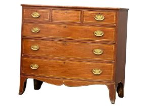 A George IV Inlaid mahogany box front chest of drawers with brass drop handles on splayed feet.