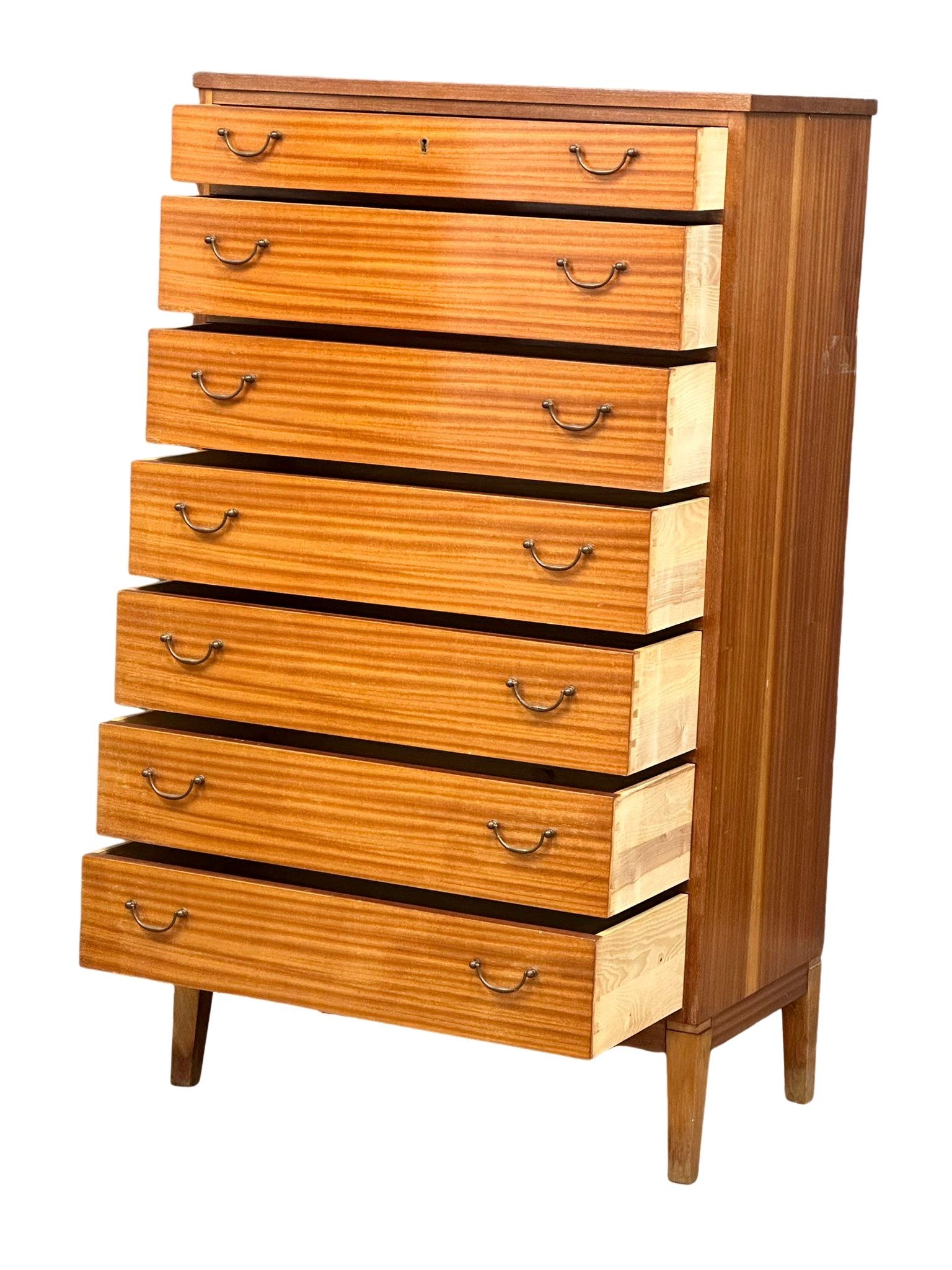 A large Danish Mid Century tola wood tallboy chest of drawers. 75.5x43.5x132.5cm(4) - Image 5 of 8